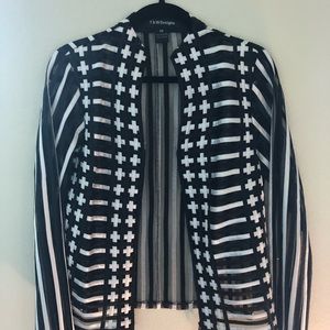Size M. Eye catching T&W designs black and white sheer jacket